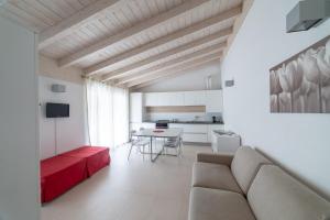a living room with a couch and a table at La Betulla in Mantova