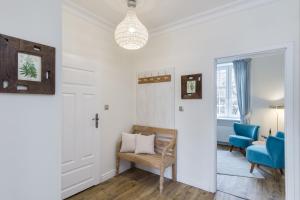 Łóżko lub łóżka w pokoju w obiekcie Elite Apartments Świętego Ducha Prestige