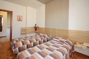 Posteľ alebo postele v izbe v ubytovaní Casa Francesca