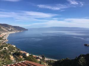 a view of a large body of water at B&B Martina in Taormina