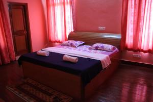Un ou plusieurs lits dans un hébergement de l'établissement Chandruma Cottage