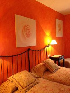 A bed or beds in a room at Hotel Sierra Quilama