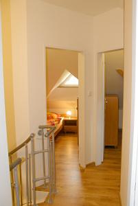Posteľ alebo postele v izbe v ubytovaní Apartmány Ilona