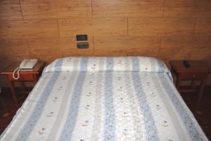 Postel nebo postele na pokoji v ubytování Hostal Castilla