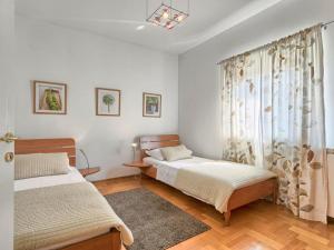 Posteľ alebo postele v izbe v ubytovaní Villa Carmen