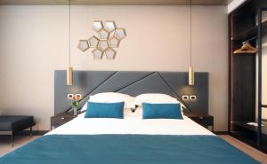 Voodi või voodid majutusasutuse The Hive Hotel toas