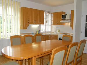 Kuchyňa alebo kuchynka v ubytovaní Apartmány Ilona