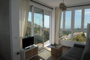 TV a/nebo společenská místnost v ubytování Casa Raquel