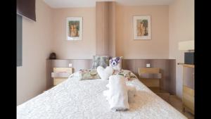 Posteľ alebo postele v izbe v ubytovaní Apartamento Playa y Piscina 1-2 personas + 9 fotografií