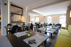Posezení v ubytování Airone City Hotel + 37 fotografií