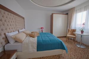 Letto o letti in una camera di New Hotel