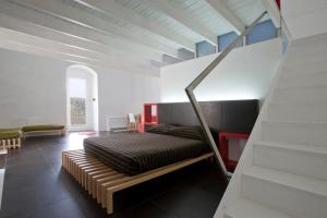 Postel nebo postele na pokoji v ubytování Basiliani Hotel + 37 fotografií