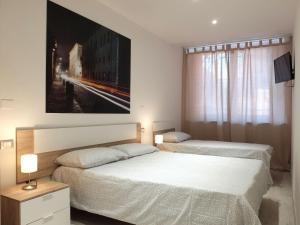Ένα ή περισσότερα κρεβάτια σε δωμάτιο στο Centro Storico Rooms