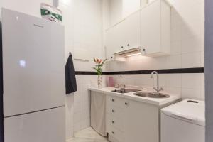 Kuchyň nebo kuchyňský kout v ubytování Precioso Apartamento Sevilla Centro