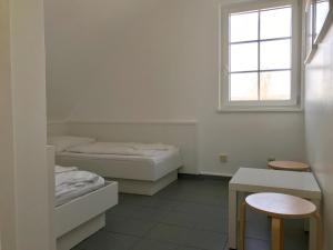 斯托赫营地布尔巴赫旅馆客房内的一张或多张床位