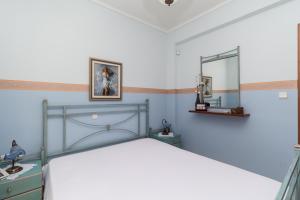 Postel nebo postele na pokoji v ubytování Kyrana Apartments