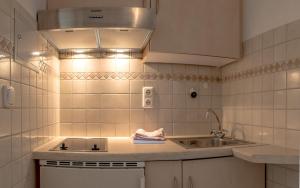 Kuchyň nebo kuchyňský kout v ubytování Haus Himmelreich + 32 fotografií