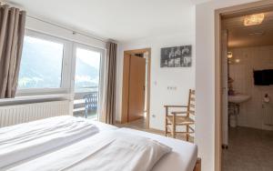 Postel nebo postele na pokoji v ubytování Haus Himmelreich
