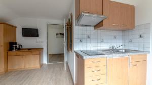 Kuchyň nebo kuchyňský kout v ubytování Haus Himmelreich