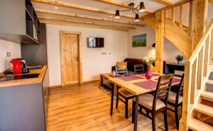 Kuchyň nebo kuchyňský kout v ubytování Holiday Village Tatralandia