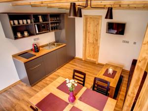 Kuchyň nebo kuchyňský kout v ubytování Holiday Village Tatralandia