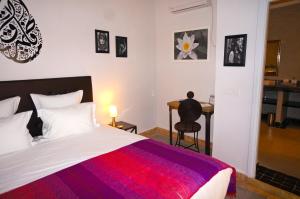 Postel nebo postele na pokoji v ubytování Riad Shanima SPA Marrakech