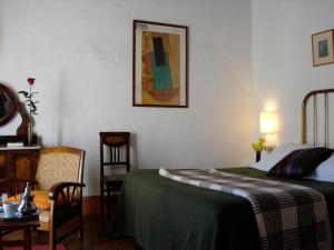 Postel nebo postele na pokoji v ubytování La Casa Grande