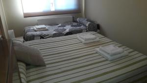 Posteľ alebo postele v izbe v ubytovaní Apartamento turistico Olite