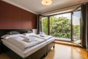Voodi või voodid majutusasutuse Hotel Mandát toas