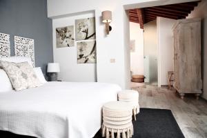 Ένα ή περισσότερα κρεβάτια σε δωμάτιο στο Dojo Bianco