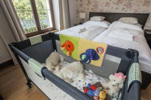 Voodi või voodid majutusasutuse Hotel Mandát toas
