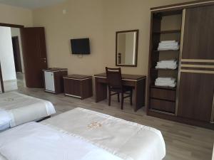 Postel nebo postele na pokoji v ubytování Hotel 725