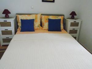 Ein Bett oder Betten in einem Zimmer der Unterkunft Haus Božica