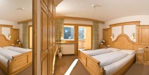 Ένα ή περισσότερα κρεβάτια σε δωμάτιο στο Hotel Pider