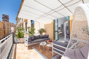 A seating area at La Piazzetta Guest House