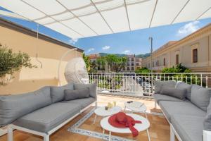 A seating area at La Piazzetta Guest House