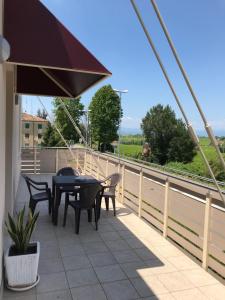 A balcony or terrace at Gardaselle Holiday Rooms