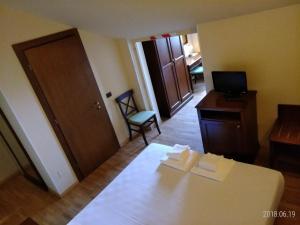 Posteľ alebo postele v izbe v ubytovaní Hotel Belvedere + 32 fotografií
