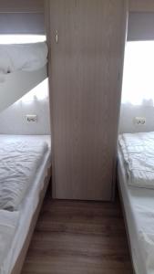 Postel nebo postele na pokoji v ubytování Middenin