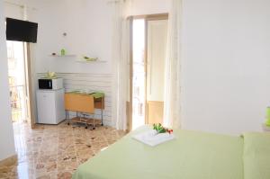 A kitchen or kitchenette at Le Sette Meraviglie