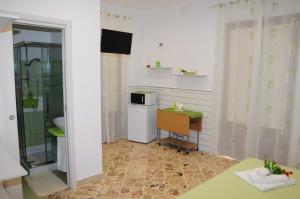 A kitchen or kitchenette at Le Sette Meraviglie