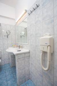 Kúpeľňa v ubytovaní Mon Repos Hotel