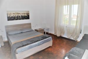 Postel nebo postele na pokoji v ubytování Casa Felice