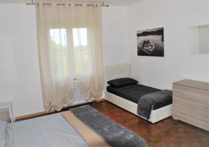 Postel nebo postele na pokoji v ubytování Casa Felice