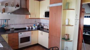 Kuchyňa alebo kuchynka v ubytovaní Apartamento con estupendas vistas