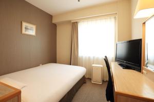TV a/nebo společenská místnost v ubytování Smile Hotel Shimonoseki
