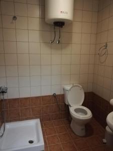 A bathroom at Anilio Rooms Még 21 kép
