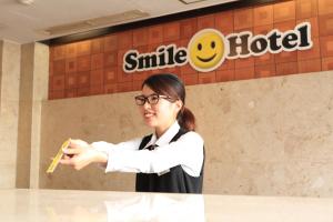 Členové personálu v ubytování Smile Hotel Shimonoseki