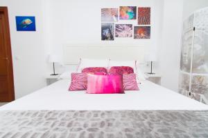 Postel nebo postele na pokoji v ubytování Good Vibes Estudio Deluxe Trinidad 2