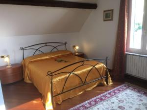 เตียงในห้องที่ Villa Puccini Bed & Breakfast